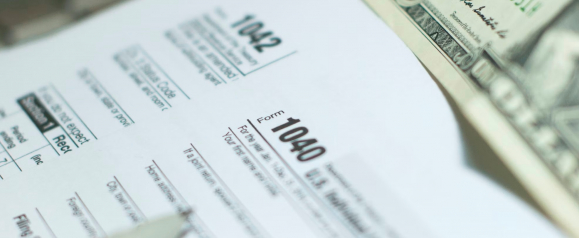 IRS Form 1040 representing the tax debt relief process