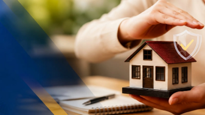 A person's hands protecting a small model house on a desk, representing First Premier Home Warranty coverage