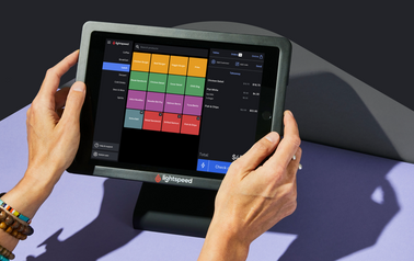Lightspeed POS restaurant ordering screen running on a tablet at checkout
